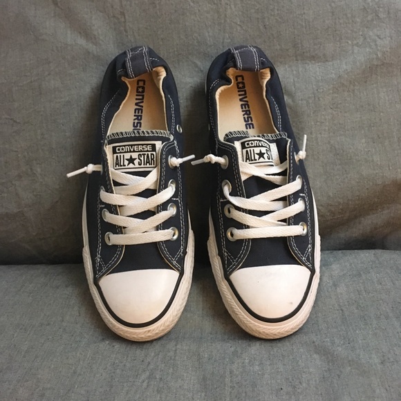 navy blue slip on converse
